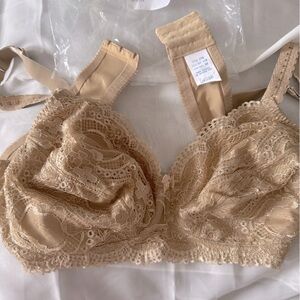 Classique 779 neutral pocketed Bra by - New w/sticker tag on plastic - Size 42B